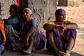 The great Chola temples of Tamil Nadu - The Brihadishwara Temple of Thanjavur. Brihadnayaki Temple (Amman temple) pilgrims resting in the shade of the mandapa. 